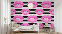 Bedroom turns playful in front of a Pop Kiss Stripes wall mural feature.