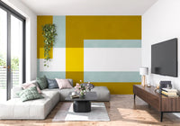 Abstract block wall mural with golden overlap shapes and pale blue structure