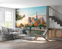 Living room Seine Reverie wall mural featuring golden dusk and river view