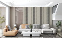 Close detail of the Artisanal Striped Linen Wallpaper showing painterly charcoal bands