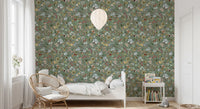 Curved leaf sprigs weave between blooms on the Watercolor Jade Green Wallpaper.
