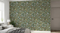 Mustard yellows and rust tones mix among watercolor blooms on this wallpaper.