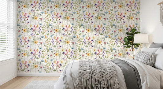 Bedroom Meadow Wallpaper with wildflower petals on a warm white base