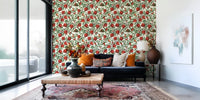 Curling branches frame this Pomegranate Orchard wallpaper as it reaches the Living room.