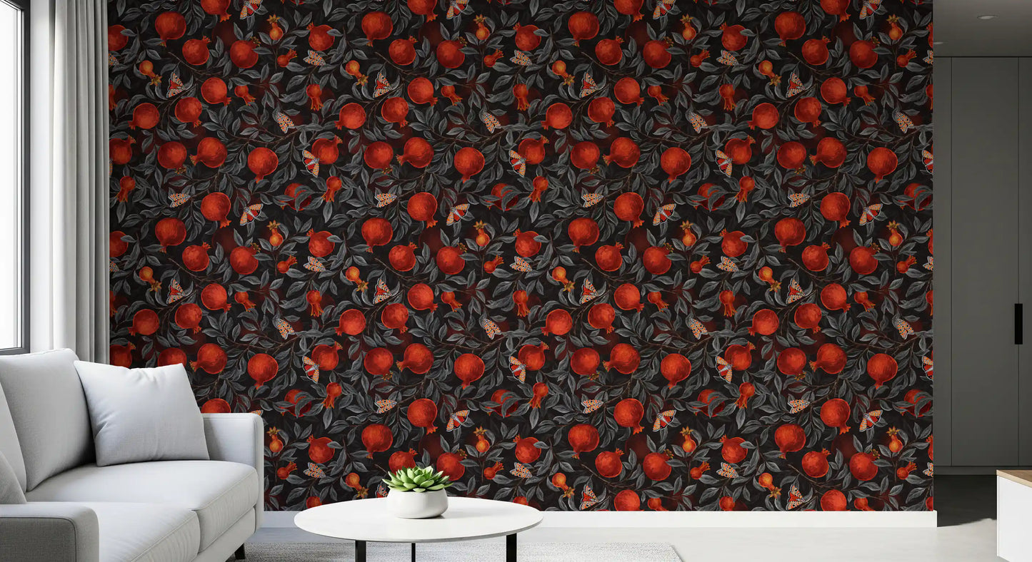 Patterned moth wings rest among ripe pomegranates on this moody-botanical wallpaper.