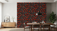 Reds, oranges, and graphite tones balance on this Pomegranates & Moths wallpaper.