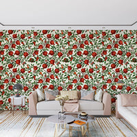 In the Pomegranate Garden Wallpaper, moths and round fruit rest amid mossy leaves.