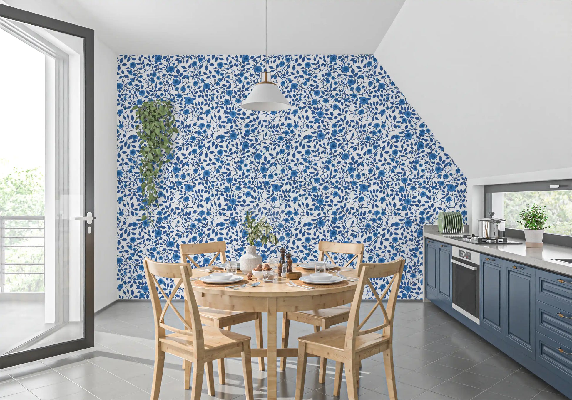 A floral repeat in Wild Roses wallpaper finishes a kitchen dining area.