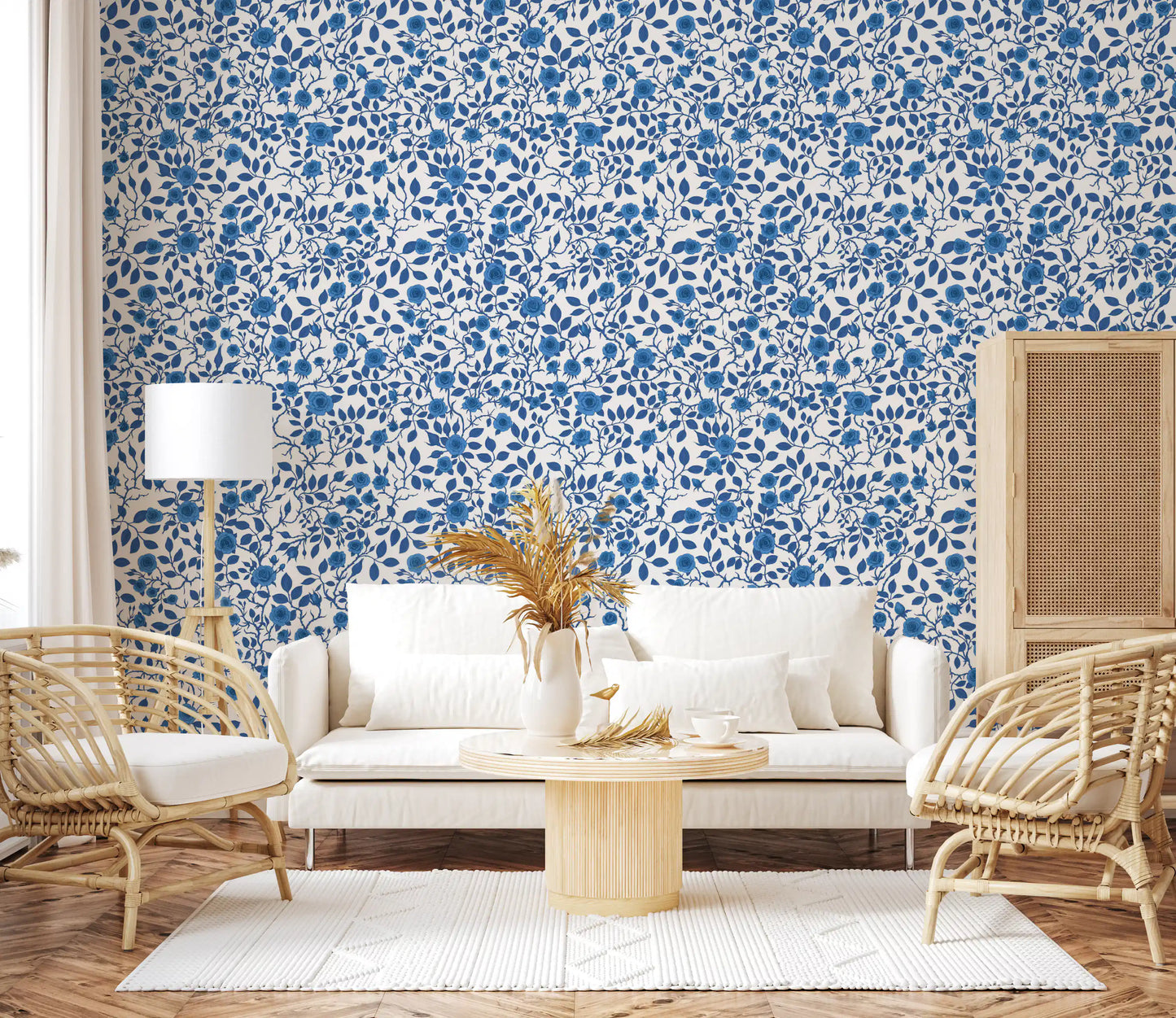 Each motif shows a bloom and small leaf in this Wild Roses Blue wallpaper.