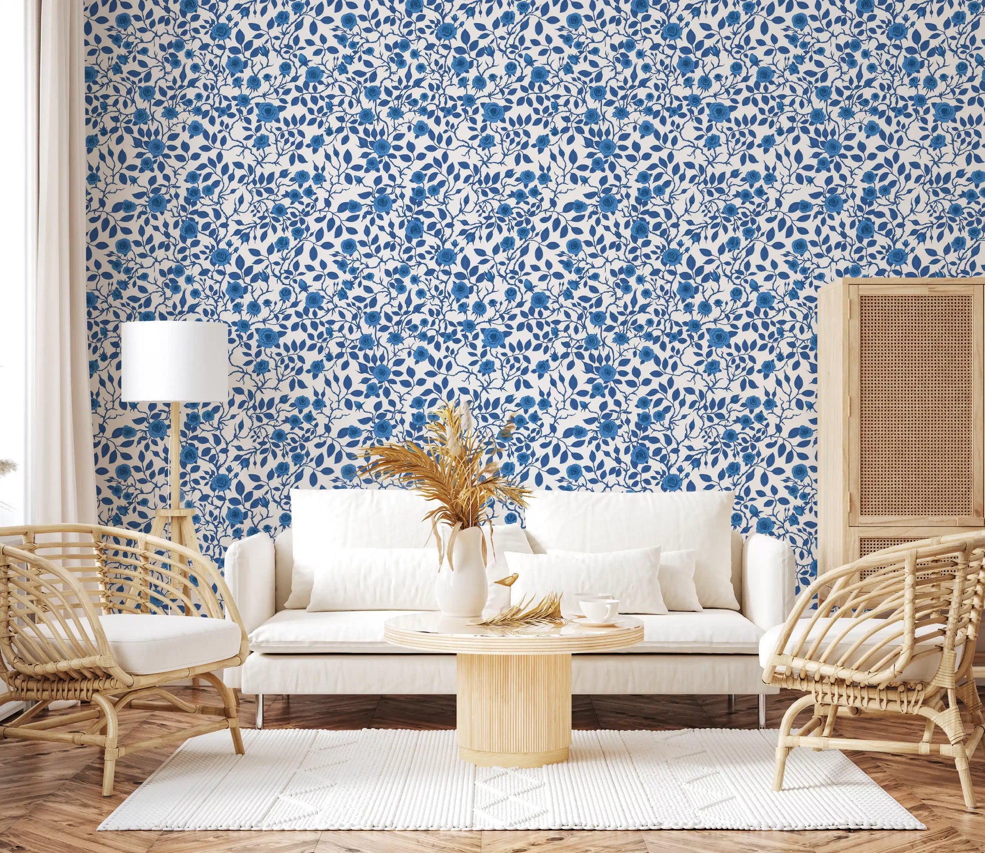 Each motif shows a bloom and small leaf in this Wild Roses Blue wallpaper.