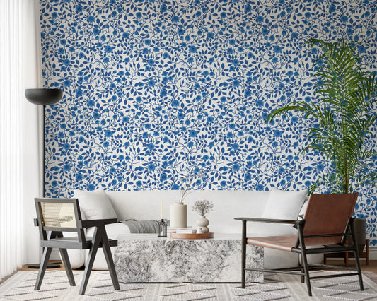 Living room takes a calm floral surface from the Blue and White Roses wallpaper.