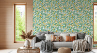 Pale yellow heads dot the Golden Bloom Rose Trellis Wallpaper in a Living area.
