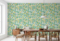 A dining room takes on a cottage-garden feel with this rose and vine wallpaper.