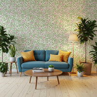 Lounge gains a relaxed cottage feel through the rose-vine wallpaper.