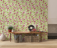 Open blossoms catch the eye on the Blooming Rose Trellis wallpaper at each repeat point.