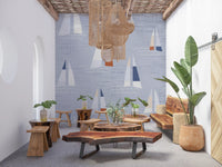 Cream sails drift over grey water on the Mid Century Sailboats Coastal Blue wall mural.