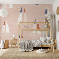 Pale ivory sails sit beside navy and rust accents on this Sailboats wall mural.
