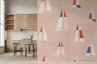 Kitchen-dining room takes on coastal calm with the Sailboats Warm Peach wall mural.