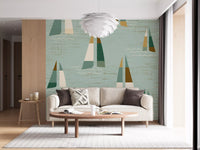 Pale sage sets the mood behind a Mid Century Sailboats wall mural in a quiet Living room.