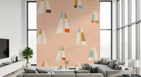 A laid-back coastal feel shapes a lounge with the Sailboats wall mural.