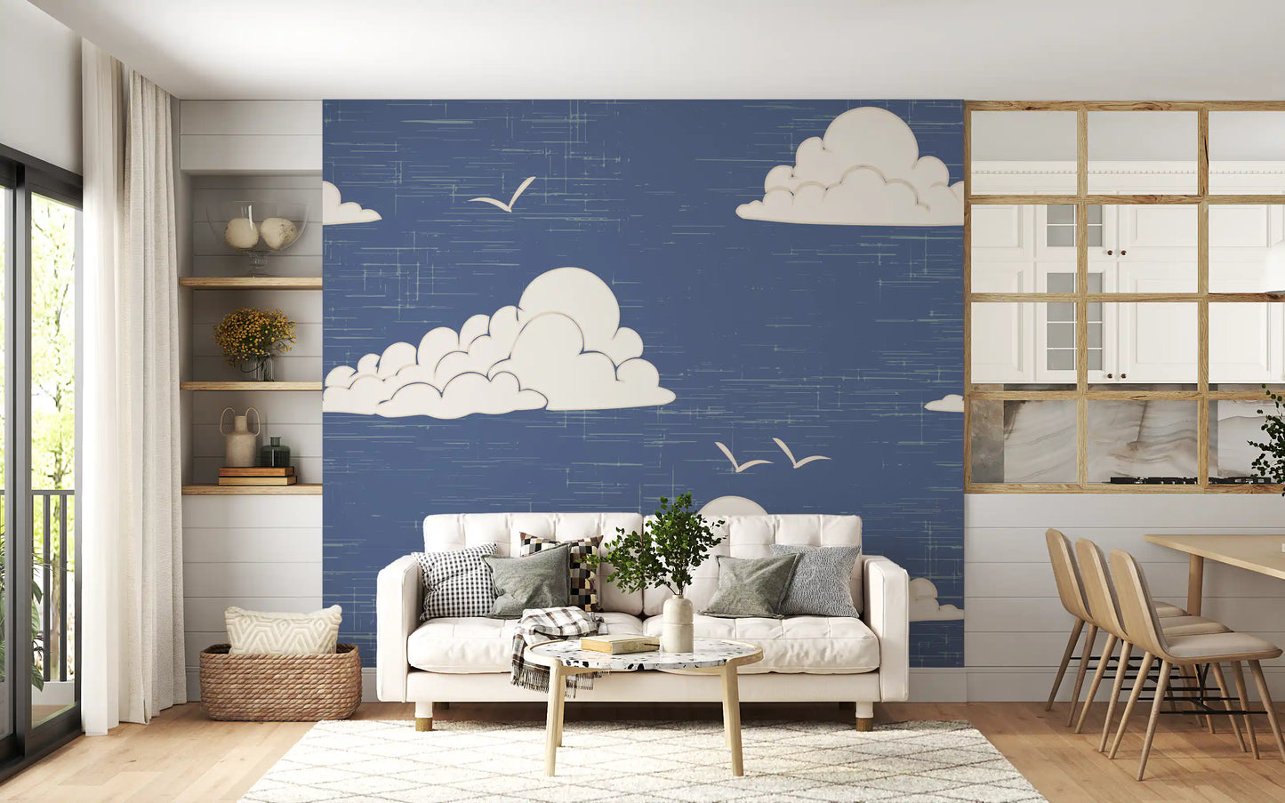 Dining room styled with a cloud and bird wall mural in dusty blue
