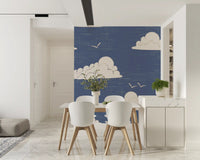 Cream clouds and birds appear on a Mid Century wall mural in a Dining room 