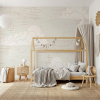 Puffy clouds and gull shapes ride over a cream sky in this Mid Century wall mural.