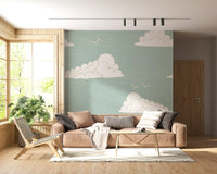 Wide cream cloud rises over a calm sage field in the Mid Century Cloud Sky wall mural.