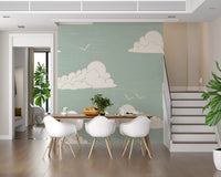 Sage-grain texture grounds a Dining room in the Mid Century Cloud Sky wall mural.