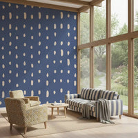 Mid Century Seed Dots wall mural styles a hallway with cream marks on dusty blue.
