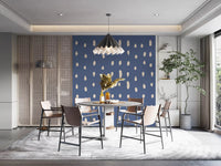 Tall and round seed shapes fall down a dining room wall mural in chalky dusty blue.