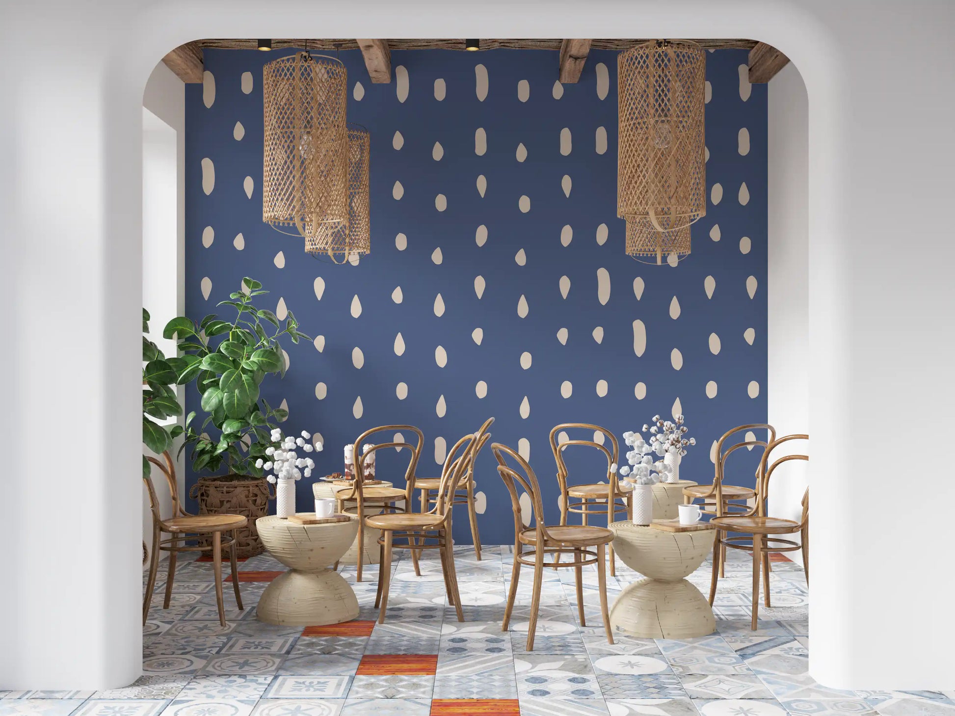 Varied droplets and ovals form a steady wall mural pattern across dusty blue.