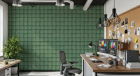 Mid Century Wavy Grid wallpaper gives a Home office a quiet sage and forest palette