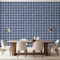 Cream channels guide muted denim tones into the Wavy Grid wallpaper.