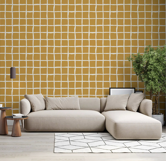Mustard squares meet a living room through the Mid Century Wavy Grid wallpaper.