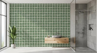 Mid Century Wavy Grid Sage wallpaper sits behind a bathroom in handmade mood.