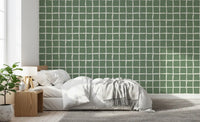 Bedroom area pairs with sage check squares on this Wavy Grid Sage wallpaper.