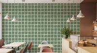 Firm sage squares balance loose cream lines on this Mid Century Wavy Grid Sage wallpaper