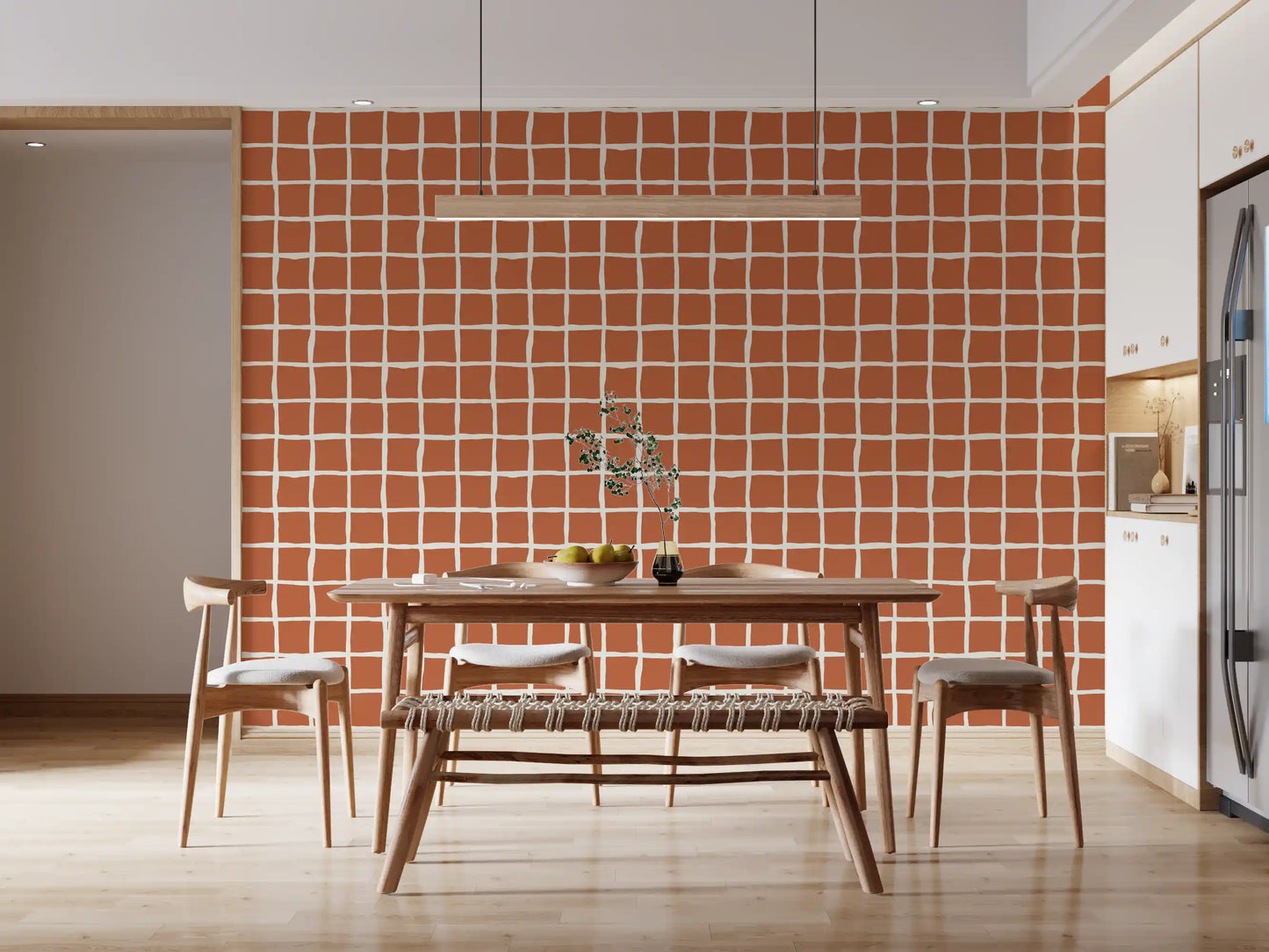 Warm terracotta squares and wonky cream channels frame a Dining area wallpaper feature.