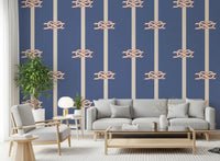 Nautical Rope Stripe wallpaper paces a Living area in cream, rust, and dusty blue.