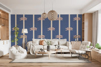 Up the full drop, the Stripe wallpaper lines a Living room in cream and rust marks.