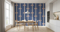 Sailor-knot motifs show clearly on the Rope Stripe wallpaper in cream and dusty blue.