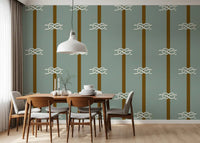 In a Dining room , sage tones and brown bands sit on Nautical Rope Stripe wallpaper.