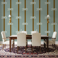 Nautical Rope Stripe wallpaper sets a coastal mood in the dining room.