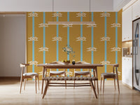 Twin sailor knots in white land on a mustard base of nautical rope stripe wallpaper.
