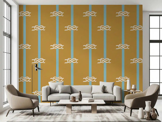 Mustard ochre adds depth to a living room behind this nautical rope stripe wallpaper.