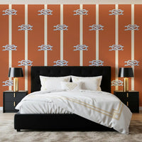 A Bedroom gains warm coastal character through Nautical Rope Stripe wallpaper.