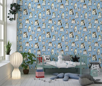 Pale blue ground sits behind every chick and adult on this Penguin Family wallpaper.