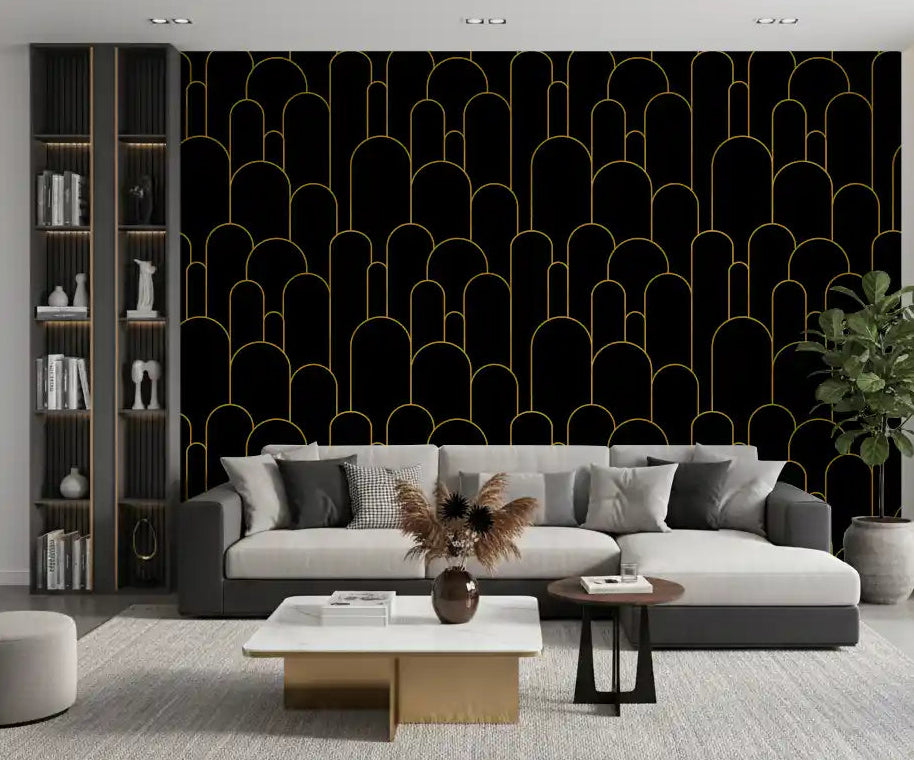 Gold curves rise on black across the living room with the Deco Arches wallpaper feature.