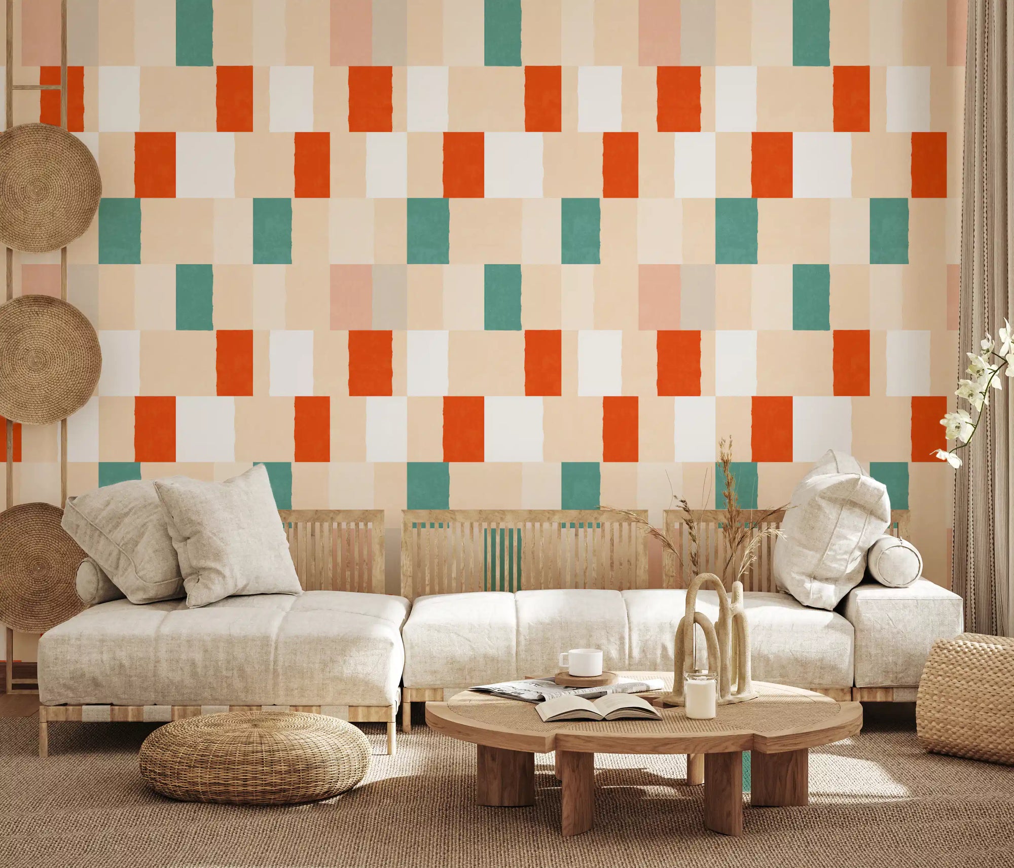 Terracotta and sage rectangles form a relaxed grid across this living room wallpaper